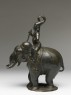 Figure of an elephant and rider from a hanging lamp (side)