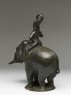 Figure of an elephant and rider from a hanging lamp (side)