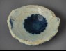 Base fragment of a bowl with rosette (front)