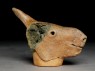 Terracotta head of an animal, possibly a bull (side)
