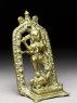 Figure of Durga slaying the Buffalo-demon (side)