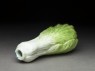 Porcelain snuff bottle in the form of a baicai cabbage (oblique)