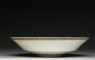 White ware dish with lotus decoration (side)