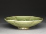 Greenware bowl with ducks amid waves (oblique)