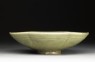 Greenware bowl with ducks amid waves (side)