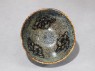 Black ware tea bowl with 'tortoiseshell' glazes (top)