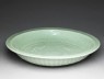 Greenware dish with fish (oblique)