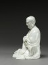 Seated figure of the Buddhist disciple Lohan (side)