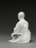 Seated figure of the Buddhist disciple Lohan (side)