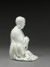 Seated figure of the Buddhist disciple Lohan (side)