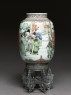 Lantern with figures in a garden (side)