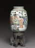 Lantern with figures in a garden (side)