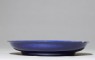 Dish with dragons under a cobalt-blue glaze (side)