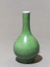 Tall-necked vase with green glaze (oblique)