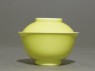 Bowl and lid with yellow glaze (side)
