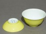 Bowl and lid with yellow glaze (oblique, open)