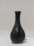 Black ware vase with prunus spray (side)