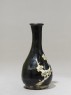 Black ware vase with prunus spray (side)