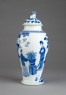 Blue-and-white jar and lid with female figures in a garden landscape (side)