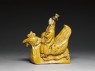 Roof ornament in the form of a figure riding a hen (side)