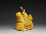 Roof ornament in the form of a figure riding a hen (side)