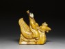 Roof ornament in the form of a figure riding a hen (side)