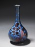 Bottle with antelope in a landscape (oblique)