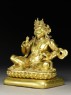 Seated figure of Kubera (side)