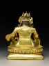 Seated figure of Kubera (back)