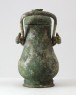 Ritual wine vessel, or you, with taotie pattern and handles in the form of animal heads (oblique)