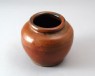 Black ware jar with russet iron glaze (oblique)