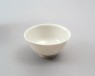 White ware bowl with two dragons and clouds (oblique)