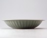 Greenware dish with three carp and lotus petals (oblique)