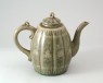 Greenware lobed ewer and lid with floral decoration (oblique)