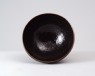 Black ware bowl with 'oil spot' glazes (oblique)