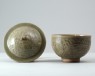 Greenware bowl and lid with floral decoration (oblique)