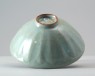 Greenware bowl with lotus petals (oblique)