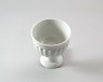 White ware stem cup with petal decoration (oblique)