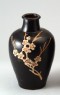 Black ware vase with plum blossom decoration (oblique)
