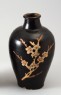 Black ware vase with plum blossom decoration (oblique)