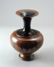 Black ware vase with streak decoration (oblique)