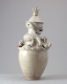 White ware funerary vase and lid with a dragon and bird (oblique)