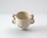 White ware cup with two dragons (oblique)