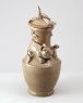 Greenware funerary vase with tiger, a puppy, and bird (oblique)