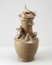 Greenware funerary vase with tiger, a puppy, and bird (oblique)