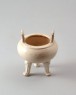 Dehua type white ware tripod incense burner with key-fret decoration (oblique)