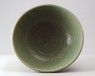 Greenware bowl with lotus flowers and waves (oblique)