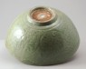 Greenware bowl with lotus flowers and waves (oblique)
