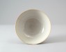 White ware bowl with lotus decoration (oblique)