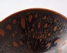 Black ware tea bowl with 'partidge feather' glazes (detail)
